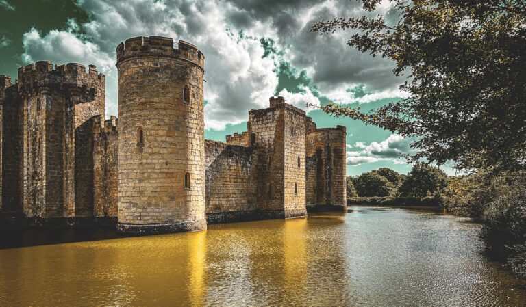 Capture the timeless beauty of Bodiam Castle in this stunning photograph. This enchanting medieval fortress, nestled amidst the serene landscapes of East Sussex, UK, is a testament to centuries of history and architectural marvel.